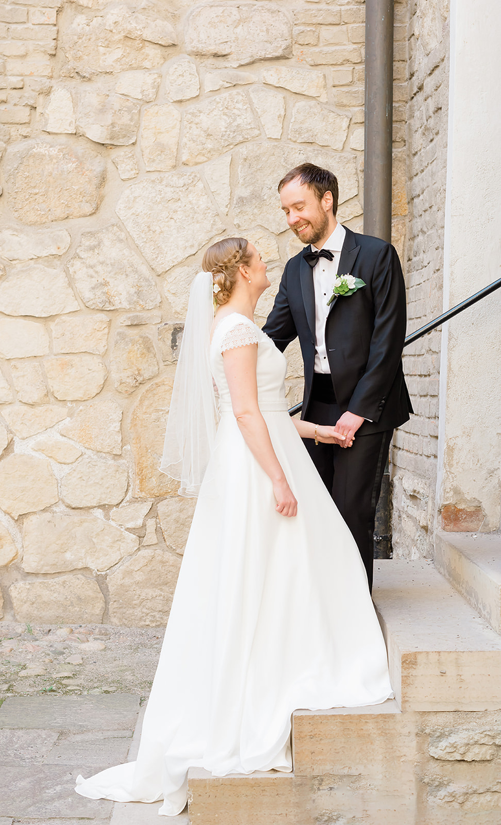 Bride and groom portraits at castle during elopement destination wedding 