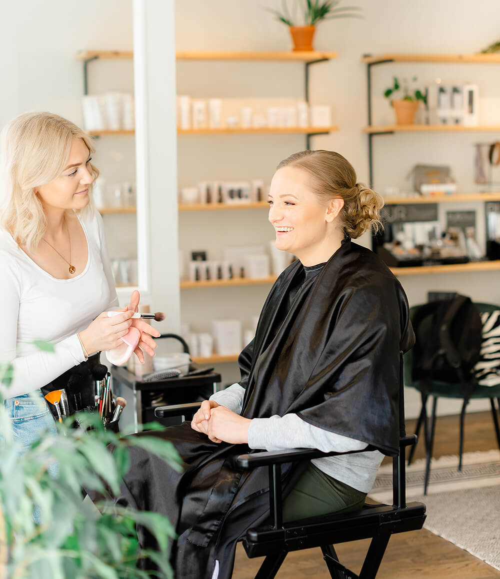 Bride getting ready with hair updo and makeup