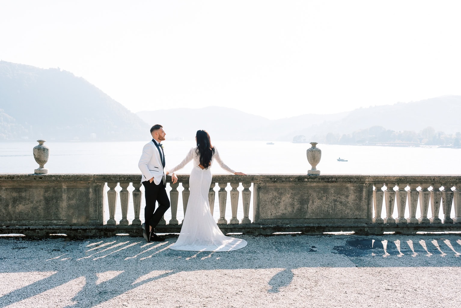 Villa Pizzo couple portrait on a terrace overlooking Lake Como