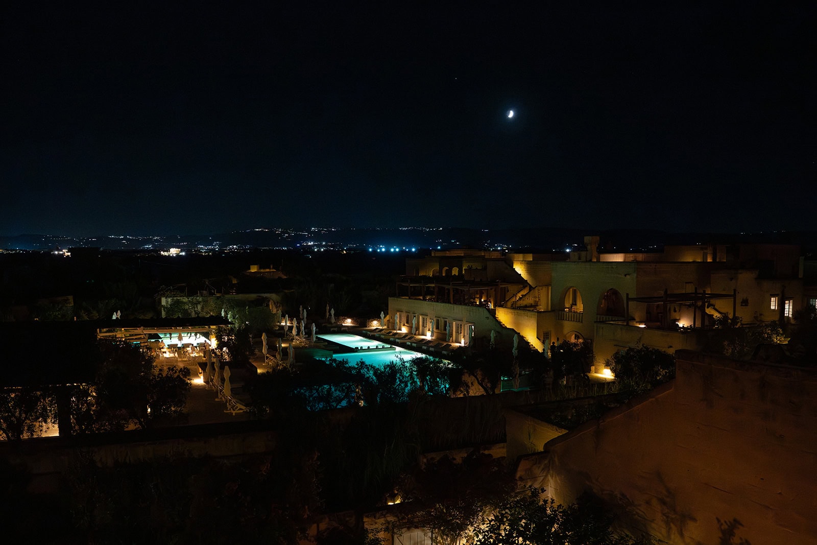 Evening image of the pool at Borgo Egnazia